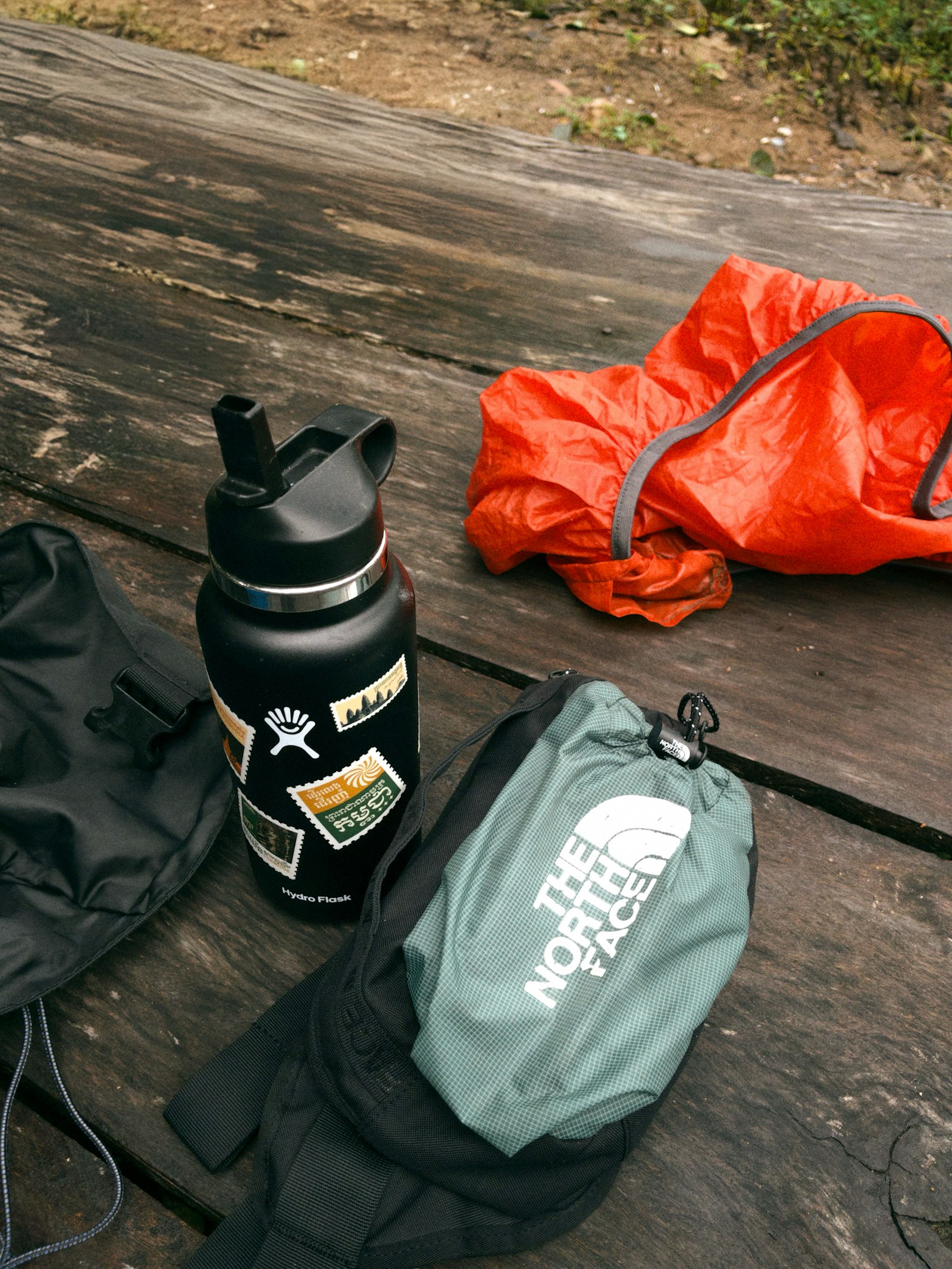 Outdoor gear arranged for a day on the trail.