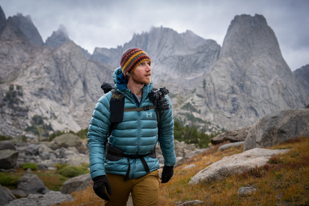 Backpacking and Shooting Photos in the Wind River Range in Wyoming The author hiking in the Wind River Range of Wyoming with a camera at his shoulder